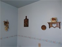 Items on wall above table