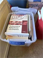 Tote with lid full of food and learning books