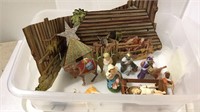 Vintage nativity pieces include the cardboard