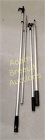 4 assorted aluminum catch poles