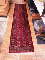 Oriental runner with red ground, blue and cream