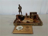 A number of Boy Scouts sculptures, wood plaques