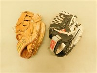 2 left handed baseball gloves