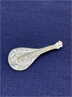 Instrument brooch
