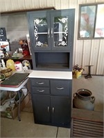 Vintage kitchen cabinet with granite top