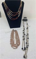 3 Necklaces. Pink- 14". Black/gray Beads- 28"