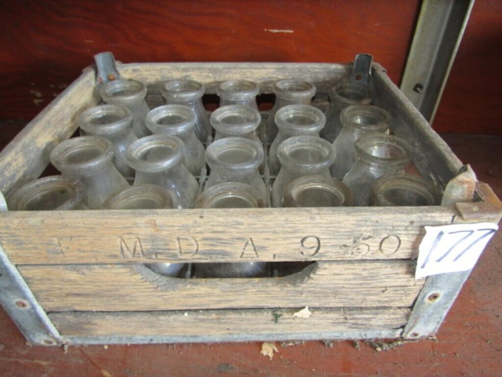 20 - 1/2 PINT MILK BOTTLES IN M D A 950 CRATE