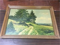 Framed landscape print of a painting