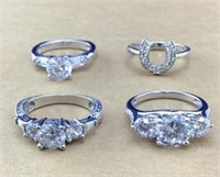 4 Pretty Sterling & CZ Rings Sizes 7 1/4 to 7 1/2.