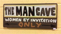 The man cave sign, woman by invitation  only,