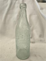 Vintage green glass F.W.COOK bottle