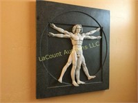 male wall plaque hanging