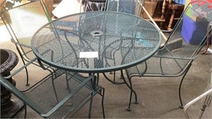 42 inch round, rock, wrought iron table with four