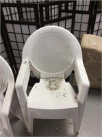 Set of four plastic outdoor chairs