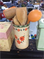 Orange floral caddy with cooking tools