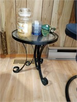 glass table and contents, candles, decoratives,