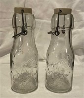 (2) VINTAGE JARS W/ PORCELAIN TOPS & WIRE BAILERS