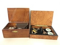 Two wood jewelry boxes with trinkets