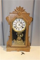 The E. Ingraham & Co. Carved Walnut Shelf Clock