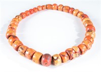 Large coral necklace.