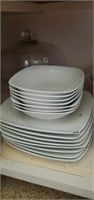 White square plates and shallow bowls
