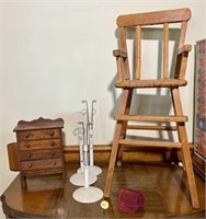 Doll highchair; miniature chest of drawers; (3)