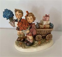 M. J. Hummel Figurine “Love’s Bounty”