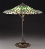 Tiffany "Lotus" leaded glass lamp with bronze