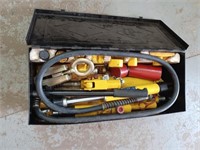 Black metal box with a disassembled jack and air