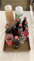 Coca-Cola bottles and cups