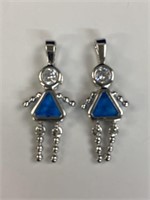 (2) 925 Sterling Silver Girl birthstone pendants,