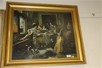 Print of musicians in gilt frame.
