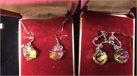 Two pairs of Crystal pierced earrings, cut with a