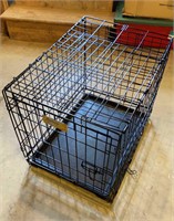 Black metal dog crate