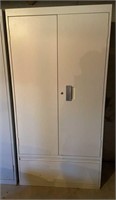 White 2 door metal cabinet with keys
