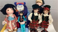 3 Asian and 3 Scottish dolls as shown, largest is