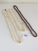 TWO IVORY COLOR BEADED NECKLACES REDDISH BROWN