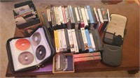Lot of cds, vhs tapes, cassette tapes, dvds
