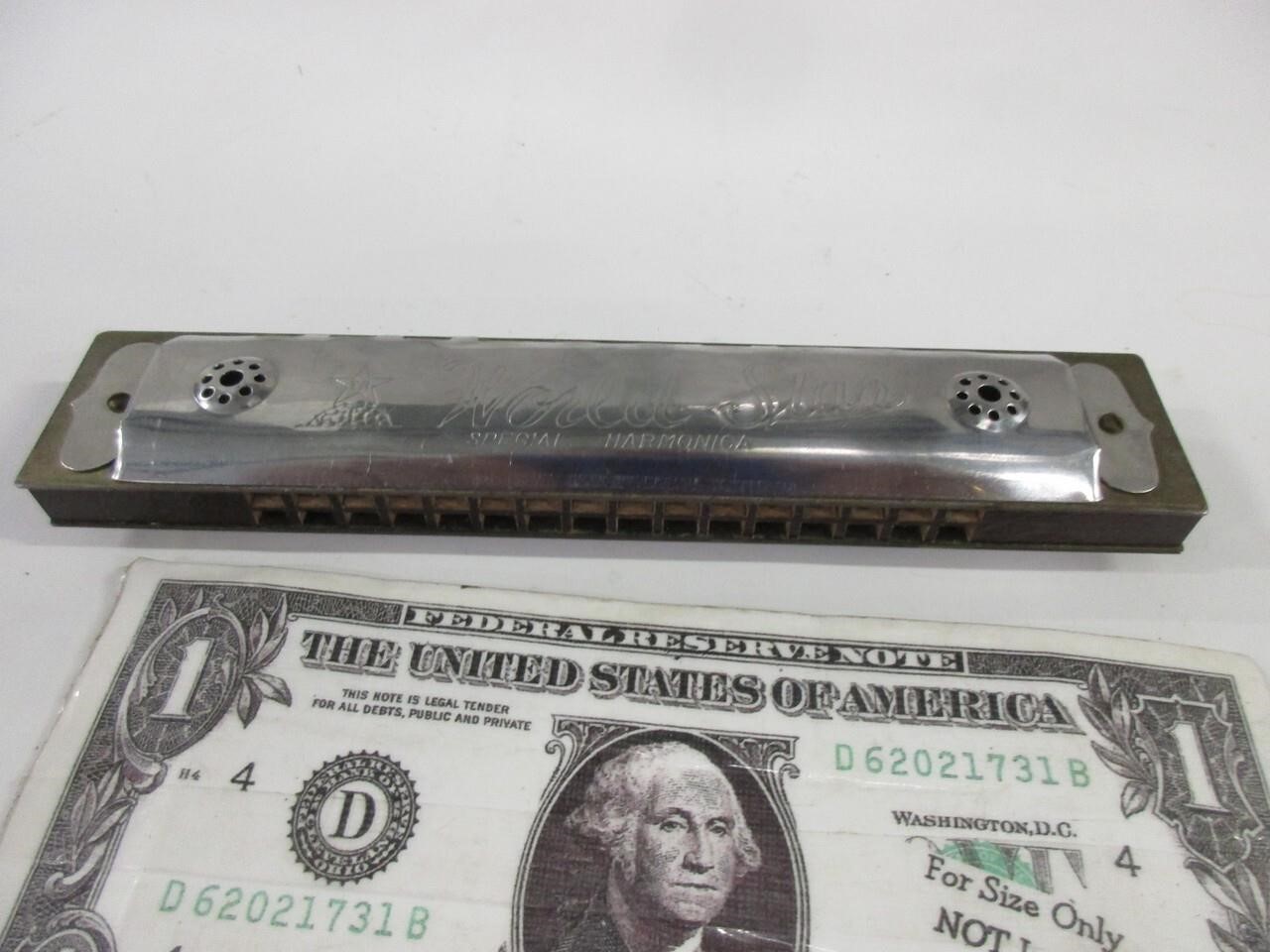 Vintage nice world star special harmonica