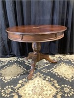 Stately flamed Mahogany top game or foyer table