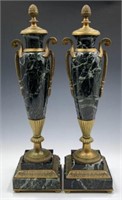 Pair of Bronze and Black Marble Urns.