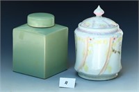 Celadon tea caddy and an antique porcelain biscuit