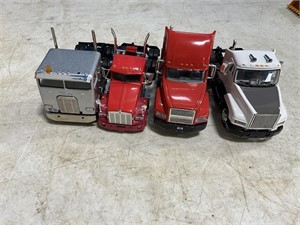 Four semi trucks