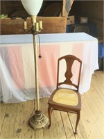 Lamp and a Cane Chair