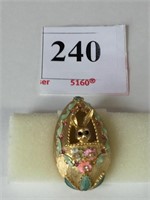 MYLU GOLD TONE METAL EGG PIN WITH BUNNY