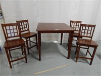 High top table with 4 chairs; table top approx. 38
