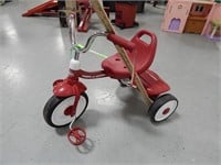 Radio flyer tricycle with adjustable seat and stor