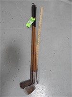 Set of antique wood handle golf clubs