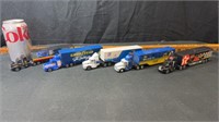 5) semi trucks