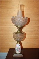 Clear glass daisy and button pattern oil lamp
